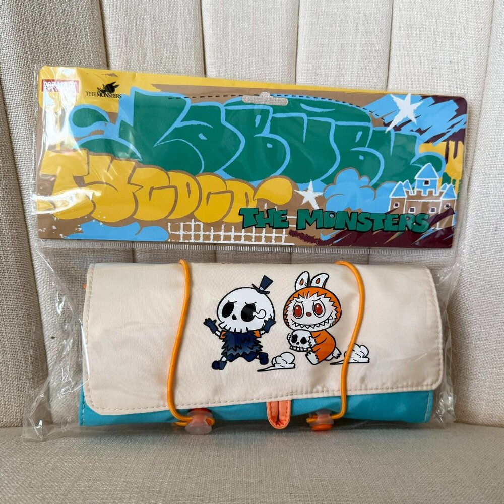 The Monsters Women’s Cosmetic Pouch in Cream and Turquoise